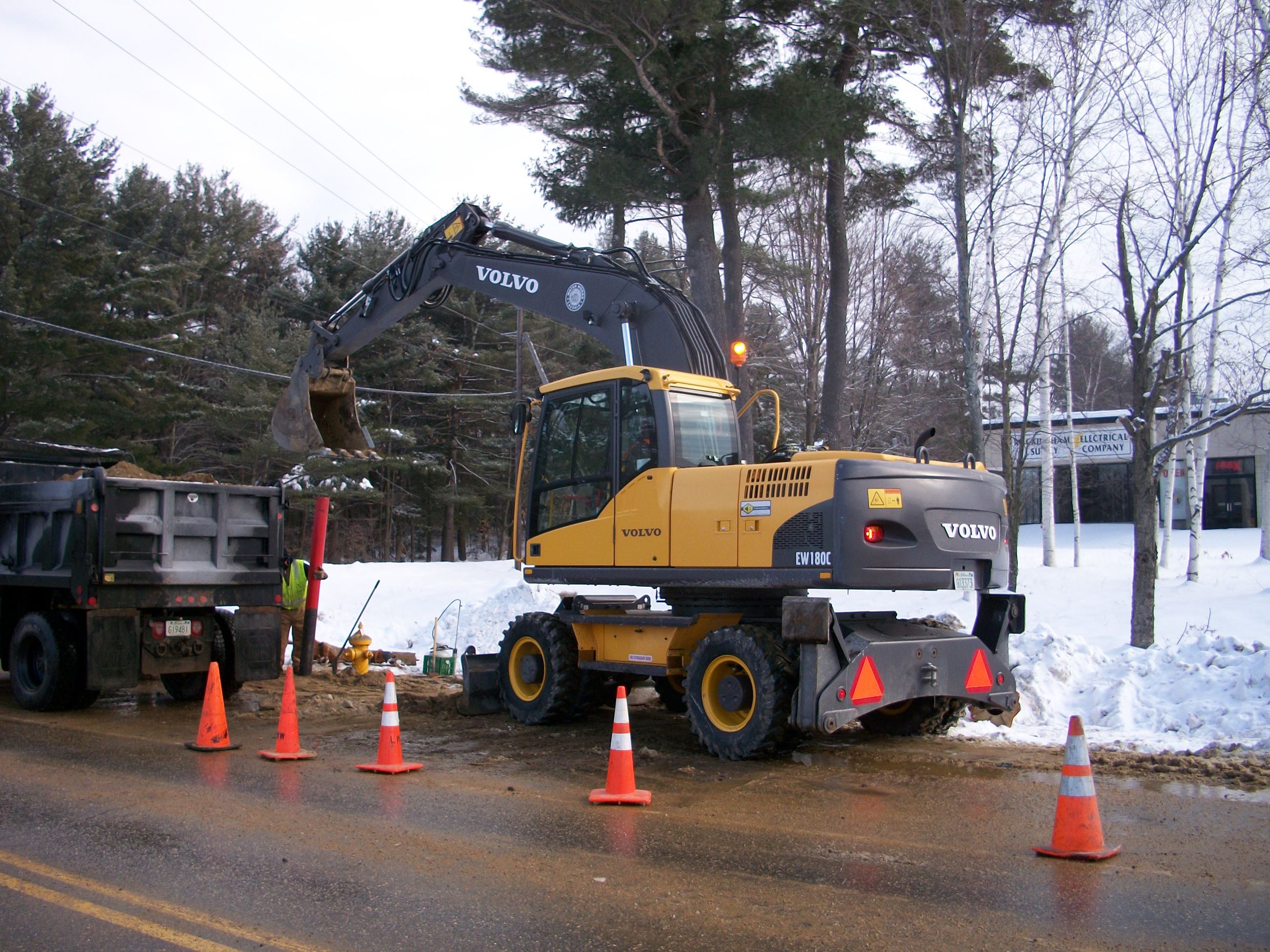 Backhoe and Dump Truck